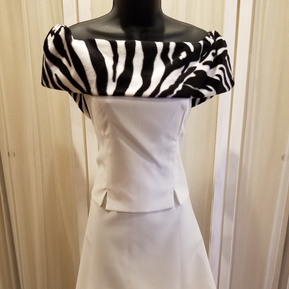 Two piece white with zebra stripes.